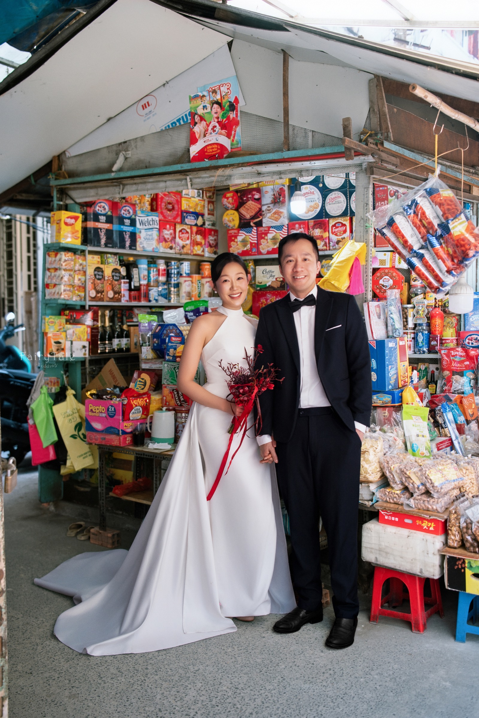 Jessica and Richard outside a corner shop